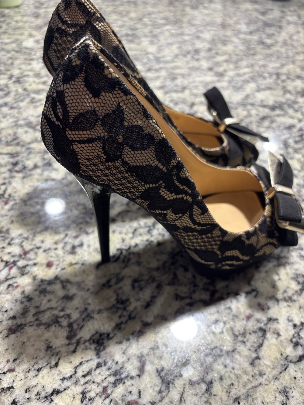GUESS Black Lace Peep-Toe Heels with Bow and Silver Accent